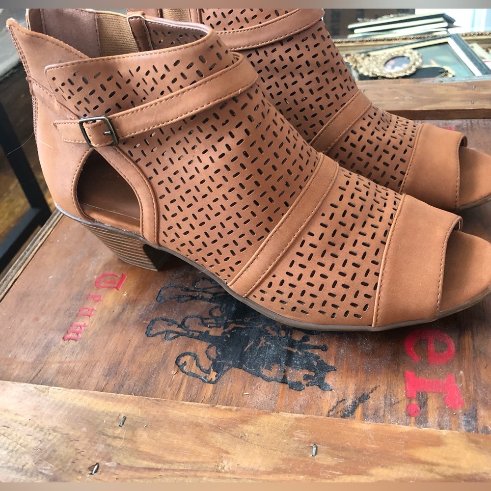 Easy Street peep toe booties with laser cut detail.